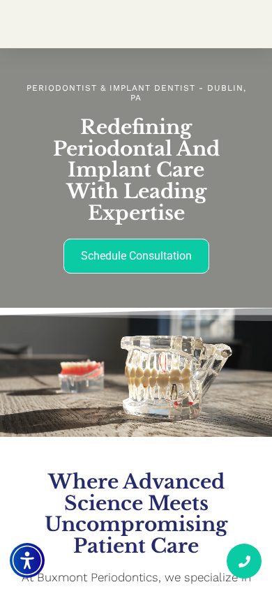 Buxmont Periodontics on a phone